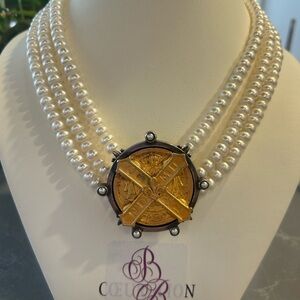 Triple-Strand White Freshwater Pearl Necklace with Gold “Augustine” Medallion